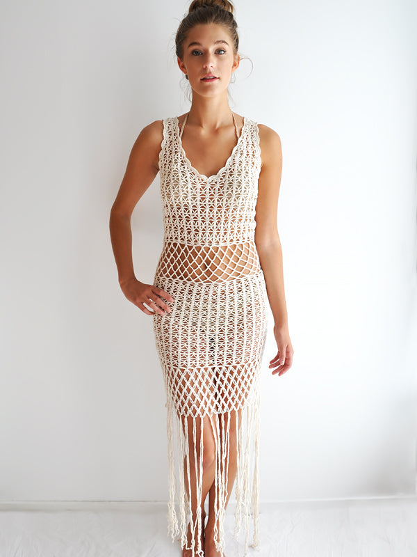 Anna Kosturova Handmade crochet dress with a peekaboo midsection, unique festival outfit with dramatic fringe hem.