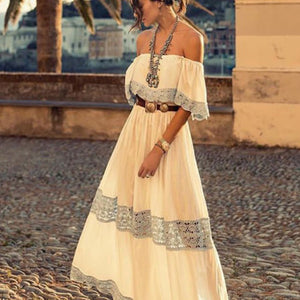 Anna Kosturova handmade crochet a-line maxi dress in cotton with lacy crochet stitch inserts. Off shoulder bodice. Crochet lace bohemian wedding dress for beach destination. Boho bride.