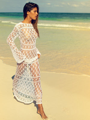 Anna Kosturova handmade crochet maxi dress in lacy stitch pattern. Lace up front bodice. Crochet lace bohemian wedding dress for beach destination. Long Sleeve Fit and flare boho bride.